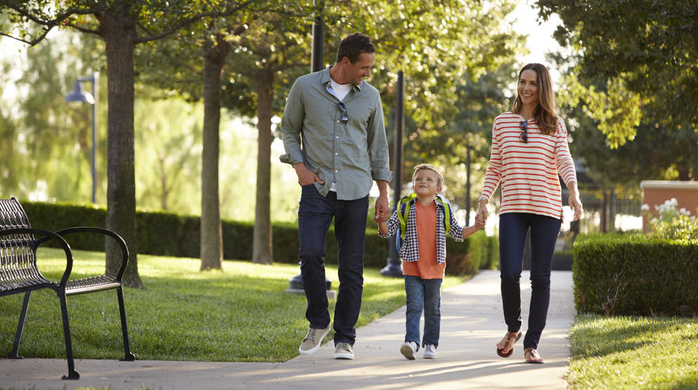 Parents Walking with Child
