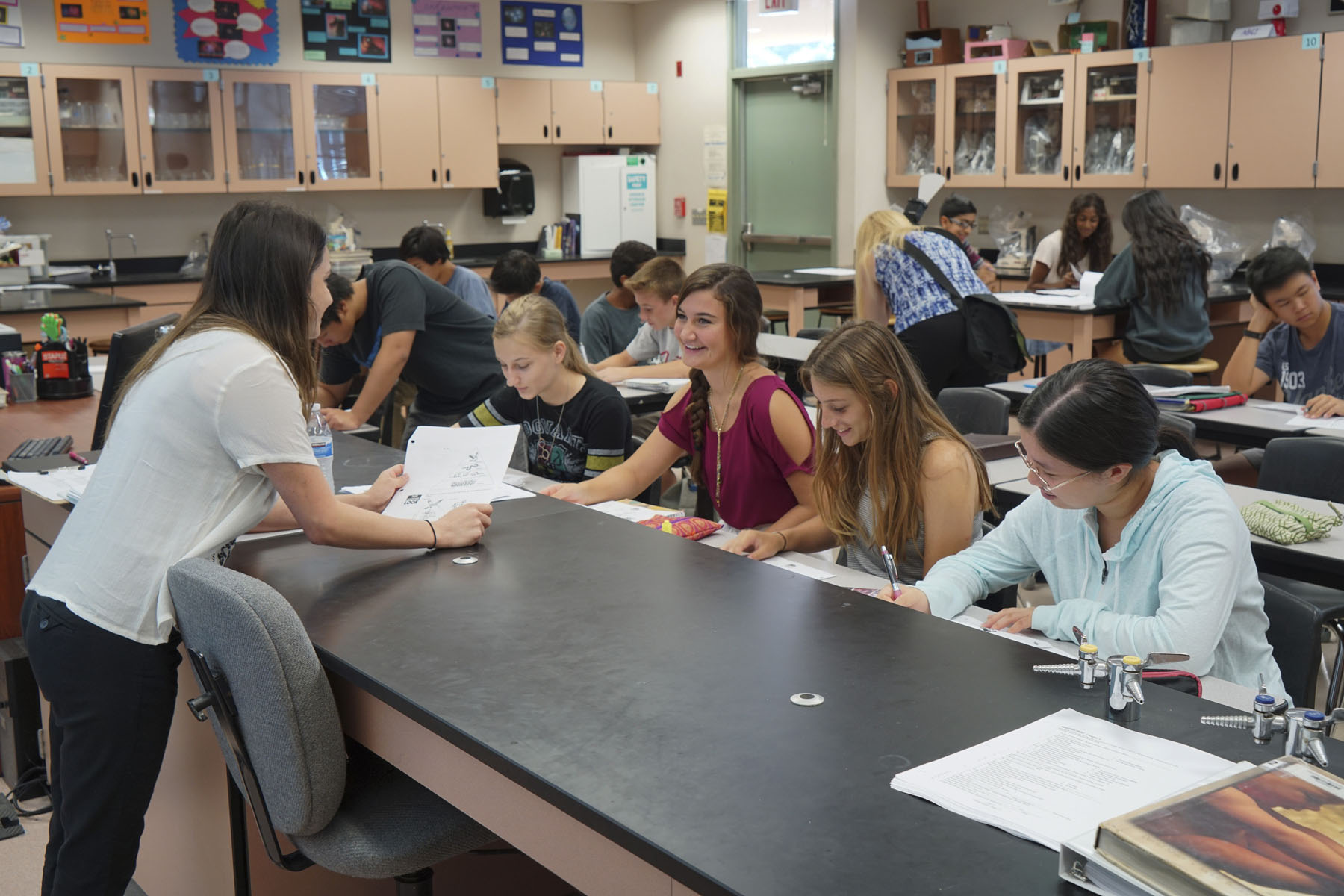 Northwood High School students talking with their teacher