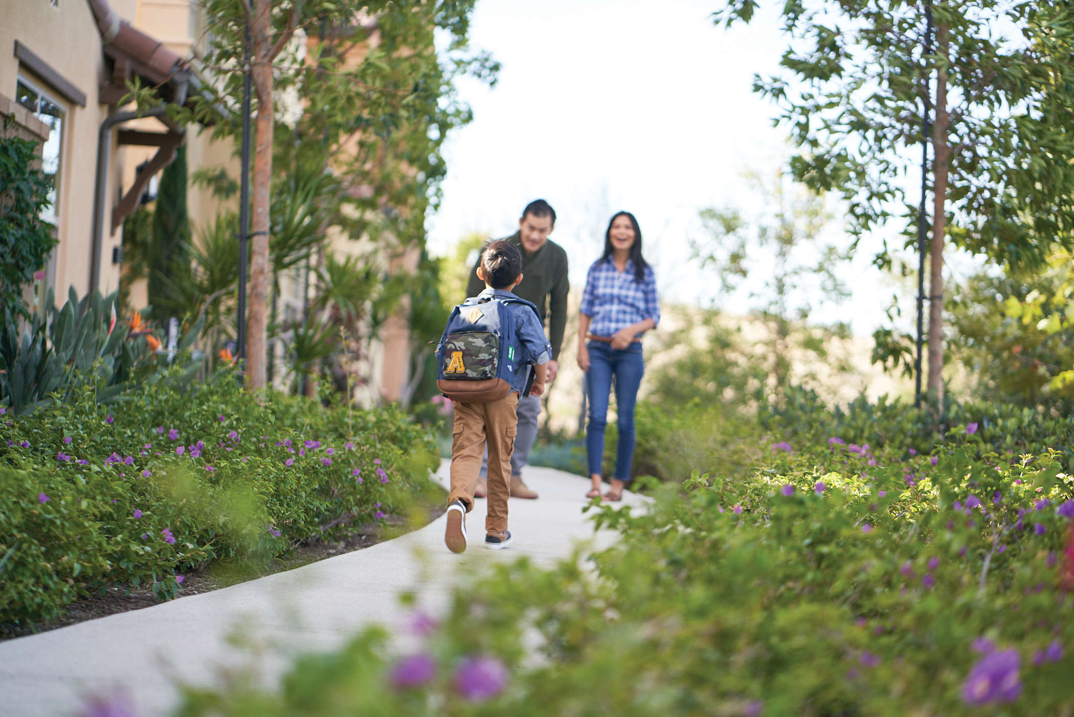 Boy with Backpack Meeting Parents