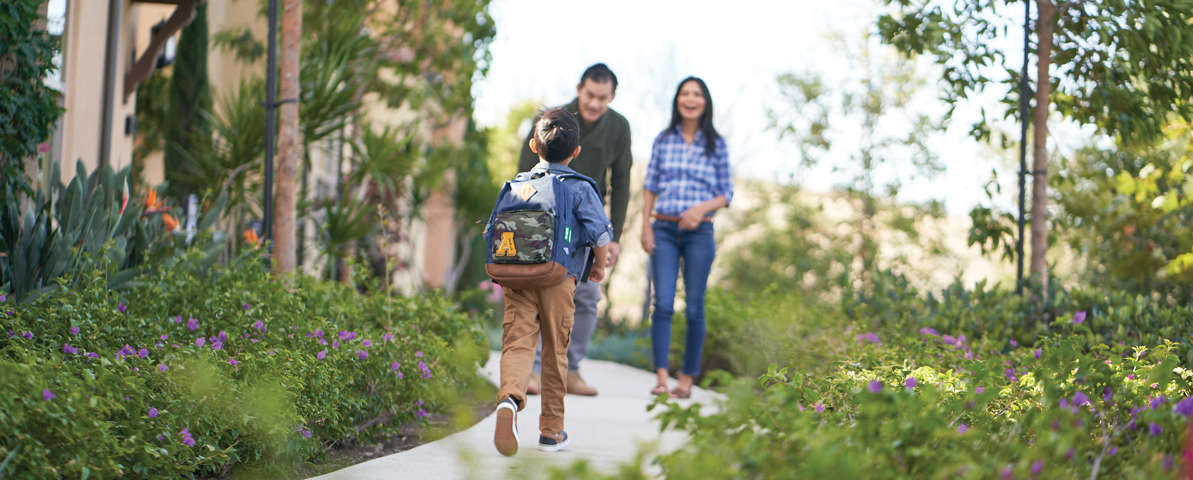 Boy with Backpack Meeting Parents