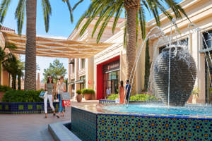 Ladies walking by fountain at Irvine Spectrum Center