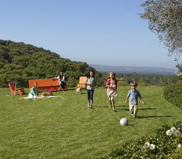 Family Playing in Field