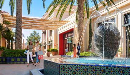 Ladies walking by fountain at Irvine Spectrum Center